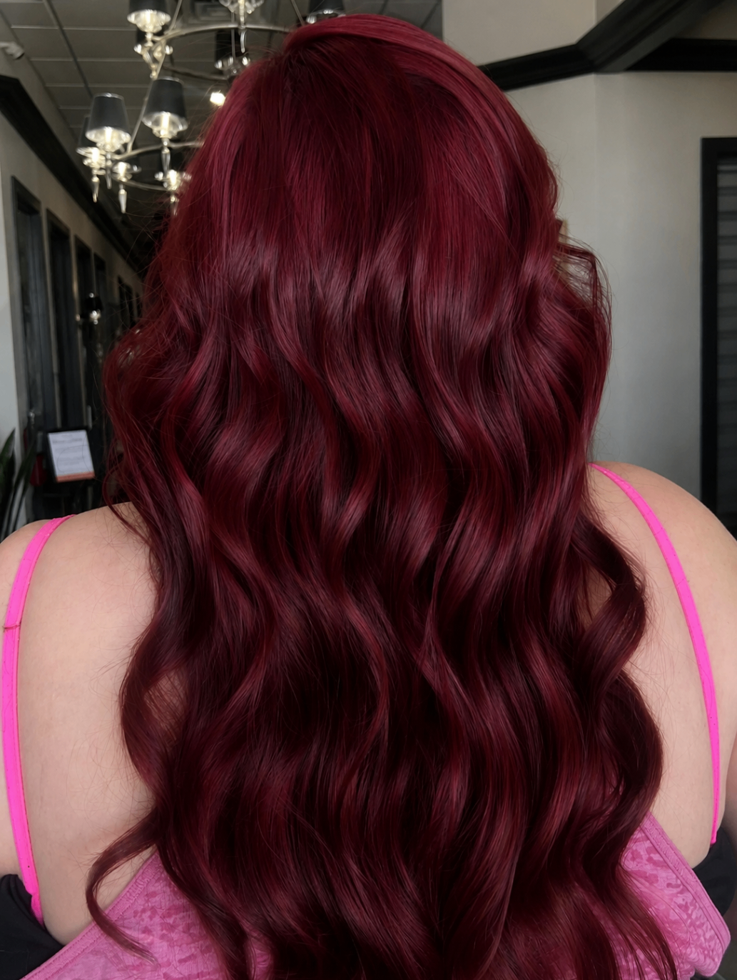 Rich burgundy waves with glossy dimension